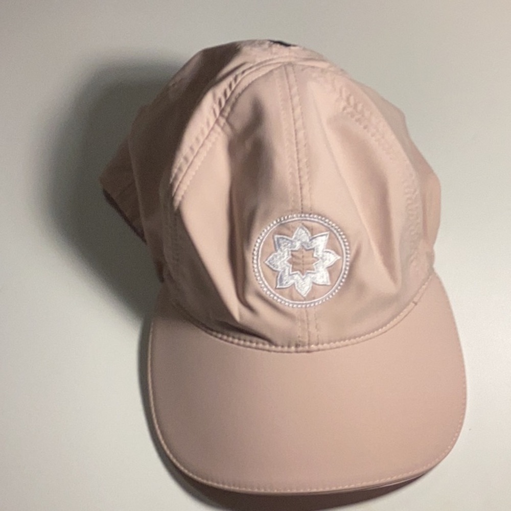 Club Pilates pink hat w pony tail opening/ magnet closure. Ponyback